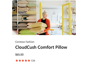 Woman holding comfort pillows in showroom